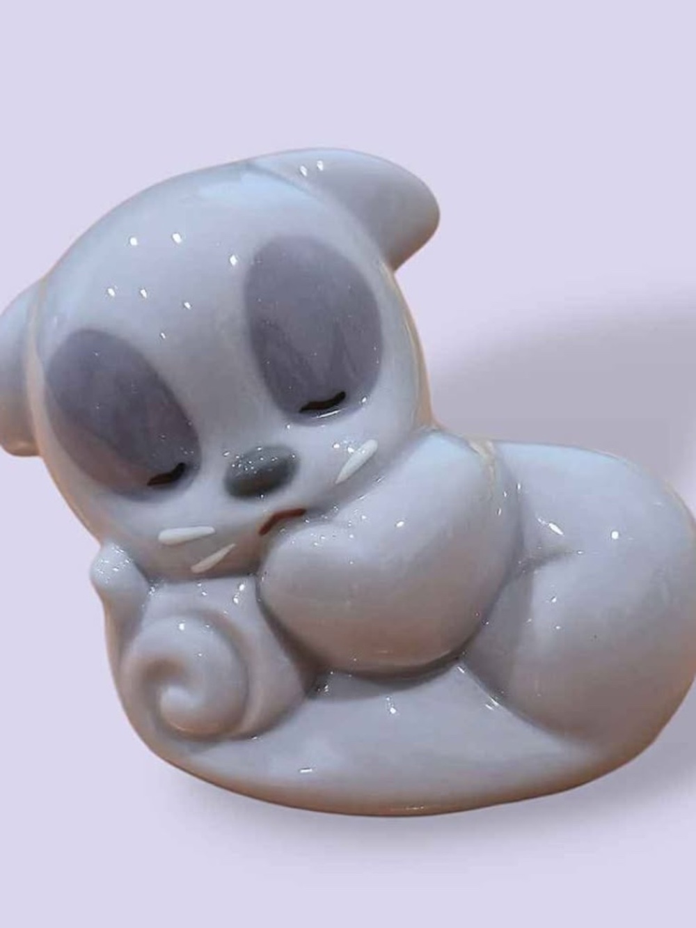 NAO by Lladro Sleeping Purple Squirrel Figurine